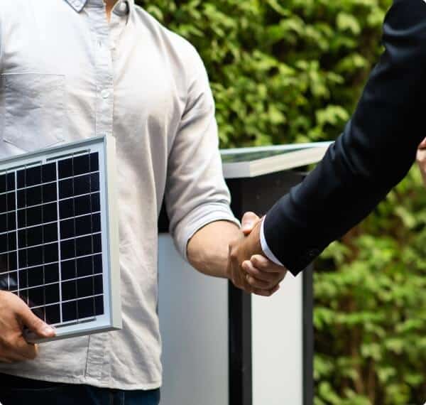 renewable energy businessmen shaking hands